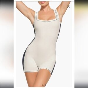 SKIMS Cream and Black Ribbed Tank Romper